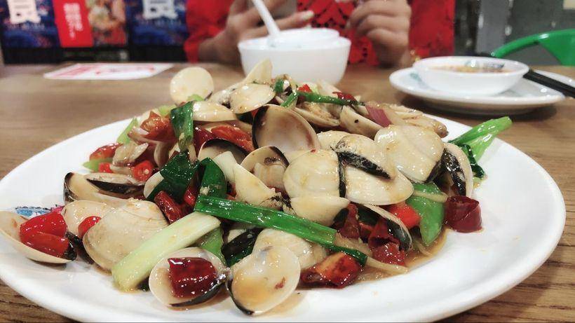 炒芒果螺：海鲜美食的详细做法与技巧分享